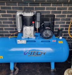 V-Tech compressed air system installed in a garage workshop.